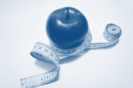 apple with measure tape on white background. Blue, Classic Blue, Phantom Blue