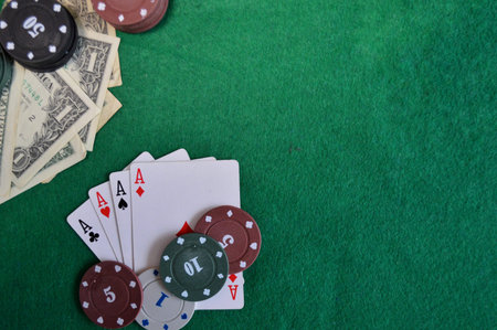Poker background - chips, cards and money on green table