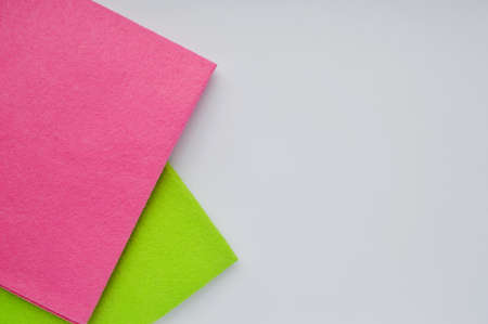 Cleaning rag in various colors on white background. Towels dayの写真素材