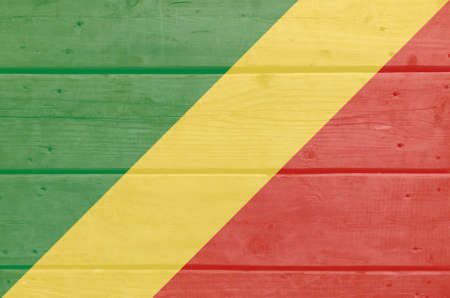 Kongo flag painted on wood plank background. Brushed natural light knotted wooden board texture. Wooden texture background flag of Kongoの写真素材