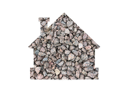 texture of small stones. Shot through the cut-out silhouette of the house.の写真素材