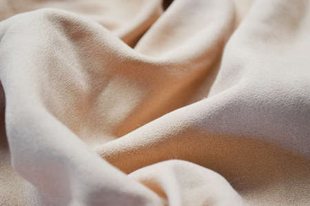 Light pink textile pattern as a background. pink material texture on fabricの写真素材