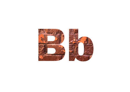 Brown texture brick wall. Shot through the cut-out silhouette of the letter Bの写真素材