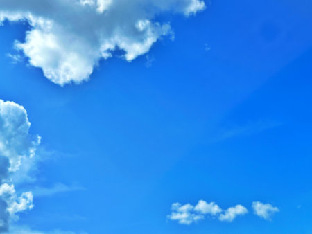 blue sky background with white clouds. international climate day. Wind Day. World Sun Day. Cloud Weaving Dayの写真素材