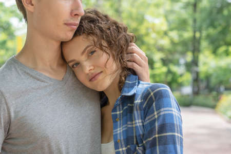 Young pretty woman leaning on the man shoulderの写真素材