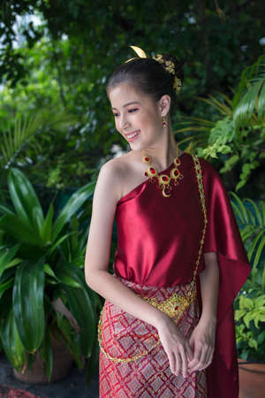 Asian girl wearing thai red dressの写真素材