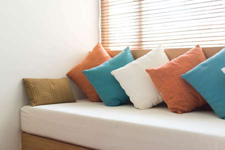 Many pillows on the sofa. Interiorの写真素材