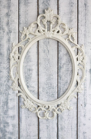 White wooden wall with vintage frameの写真素材