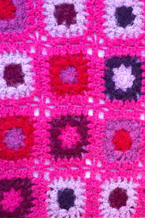Handmade pink knitting wool texture background