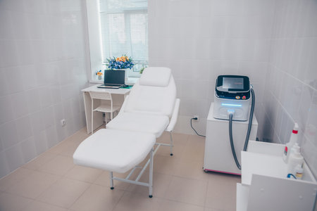 Medical equipment for cosmetology, laser epilation machine, beauty couch. Beautician cabinet, beauty salon interior details. cosmetologist's officeの写真素材