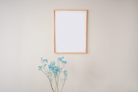Minimalistic female still life art scene pastel colors. Empty picture poster mock up frame on beige...