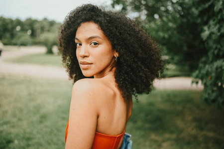 Fashion portrait of sensual attractive young naturally beautiful African American woman with afro...