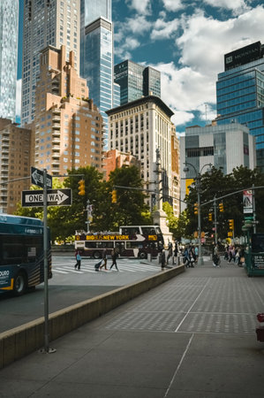 New York, USA, May 7 2023. Streets full of people crowd in Manhattan in the summer. Big city urban life concept background. Famous attractions places, touristic buses and yellow cabsのeditorial素材