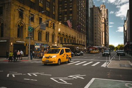 New York, USA, May 7 2023. Streets full of people crowd in Manhattan in the summer. Big city urban life concept background. Famous attractions places, touristic buses and yellow cabsのeditorial素材