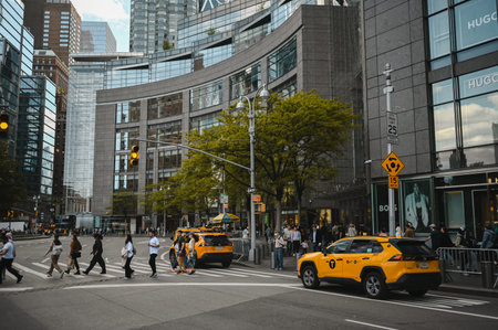 New York, USA, May 7 2023. Streets full of people crowd in Manhattan in the summer. Big city urban life concept background. Famous attractions places, touristic buses and yellow cabsのeditorial素材