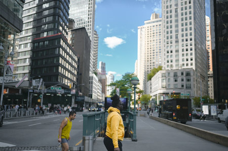 New York, USA, May 7 2023. Streets full of people crowd in Manhattan in the summer. Big city urban life concept background. Famous attractions places, touristic buses and yellow cabsのeditorial素材