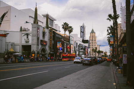 16 March 2024, Los Angeles USA. Hollywood Boulevard Walk of Fame The theater district is a famous tourist attraction. Lots of people crowd walking on the sidewalk with the stars of celebritiesのeditorial素材