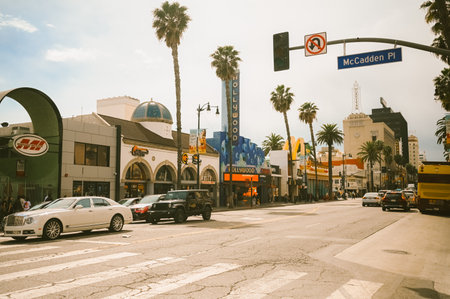 16 March 2024, Los Angeles USA. Hollywood Boulevard Walk of Fame The theater district is a famous tourist attraction. Lots of people crowd walking on the sidewalk with the stars of celebritiesのeditorial素材