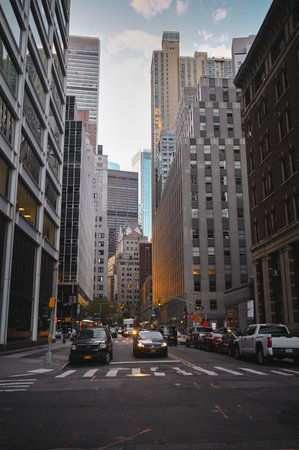 New York, USA, May 7 2023. Streets full of people crowd in Manhattan in the summer. Big city urban life concept background. Famous attractions places, touristic buses and yellow cabsのeditorial素材