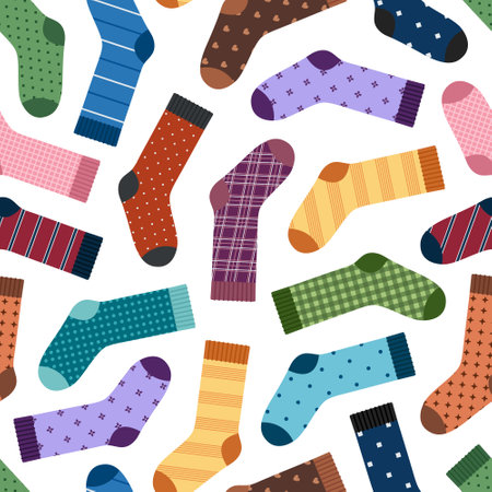 Seamless pattern with socks. Colored pairs of socks with different ornaments on white background. Foot apparel collection. Cotton and wool accessories. Vector flat illustrationのイラスト素材