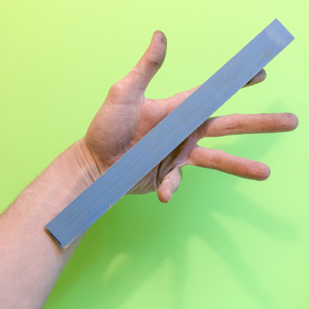 Hand holding woodの写真素材