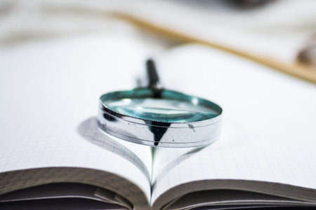 magnifier on an open bookの写真素材