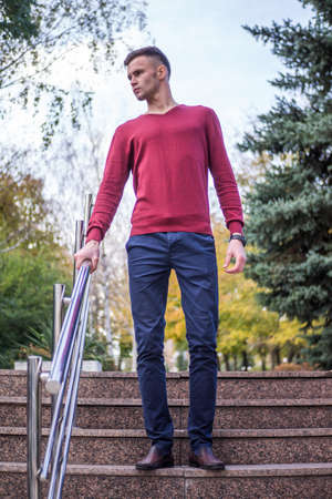 a young lad descends the stepsの写真素材