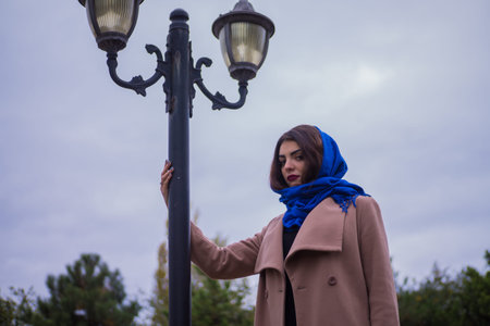 a girl near the street lampsの写真素材