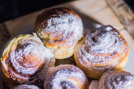 buns with powdered sugarの写真素材