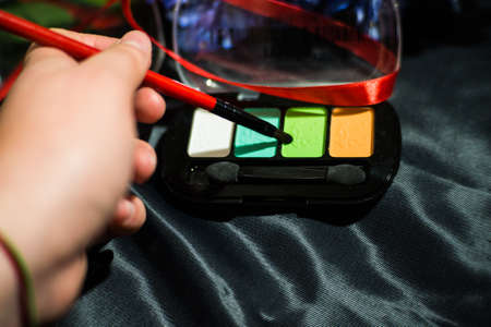 Makeup brushes with a set of eye shadowの写真素材