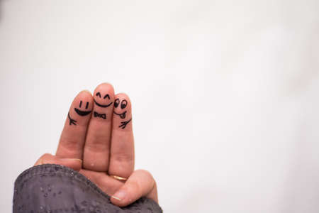 Muzzles on the phalanges of the fingers. Friendship.の写真素材