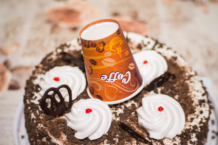 cake with paper coffee cupの写真素材