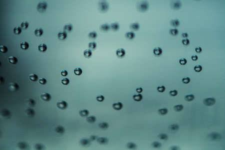 bubbles in water, oxygen on glassの写真素材