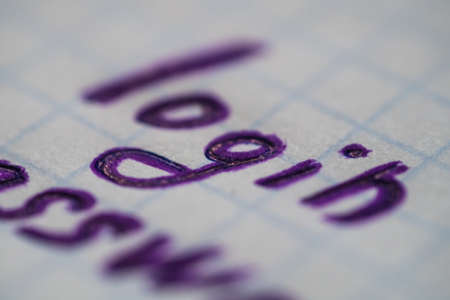 login and password written in letters on paper in a boxの写真素材