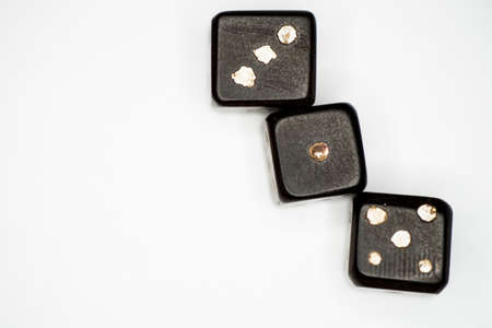 Old dices on a white backgroundの写真素材