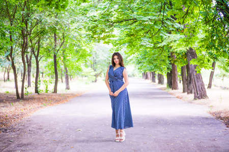 White-haired brunette girl in the parkの写真素材