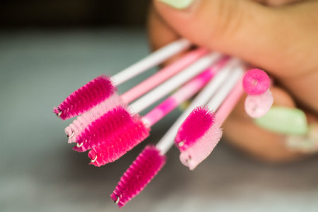Specialist eyelashes in the beauty salon increases eyelashes client