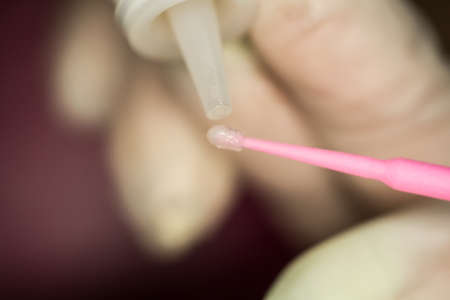 Specialist eyelashes in the beauty salon increases eyelashes clientの写真素材