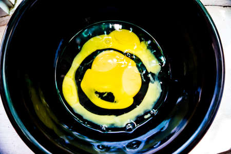 Two hammered eggs in the form of spiralの写真素材