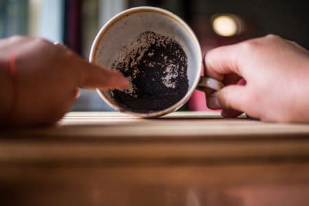 Fortune telling at the bottom of the cup, look into the futureの写真素材