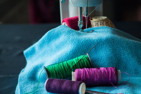 Sewing machine sews fabricの写真素材