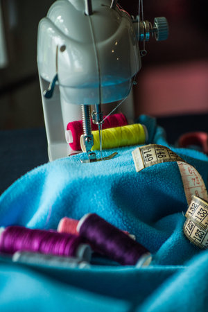 Sewing machine sews fabric