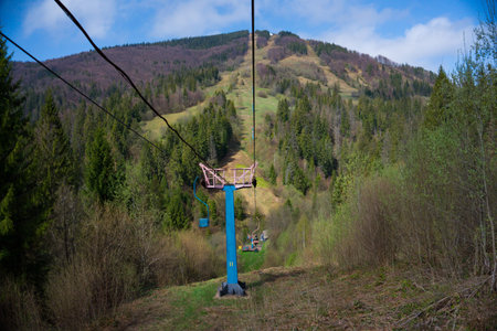 Mountain trip, cable car ride with mountain and forest view.