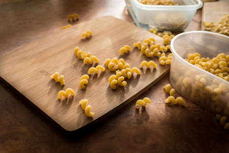 Different types of pasta Cellentani, Tortiglioni, Farfalle, spaghetti are often used in the kitchen for cooking.の写真素材