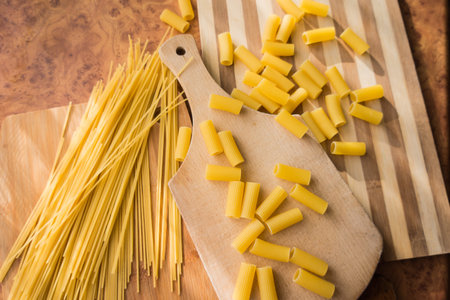 Different types of pasta Cellentani, Tortiglioni, Farfalle, spaghetti are often used in the kitchen...