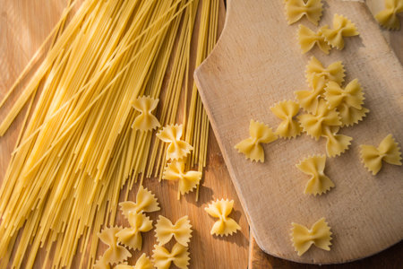 Different types of pasta Cellentani, Tortiglioni, Farfalle, spaghetti are often used in the kitchen...