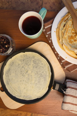 pancake week. Preparation of dough for baking delicious and ruddy pancakes from the ingredients...