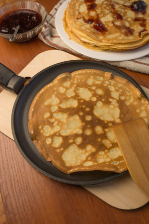 pancake week. Preparation of dough for baking delicious and ruddy pancakes from the ingredients...