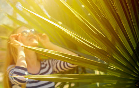 Beautiful woman relaxing in tropical resortの写真素材