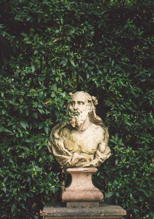 Ancient Sculptures in a European Park, turism, beautiful green place の写真素材